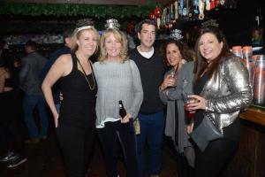 Wearing the appropriate hats for the celebration are (l-r) Jen Johnson, Amy Parsons, Joe Imhof, Miny Riskin and Tracey Bonokio. Starboard New Years