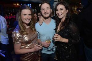 Revelers from Hockessin, (l-r) Angelina Grube, Steve Melaigh and Ashley Crossan enjoy New Year’s Eve. Starboard New Years