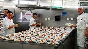 Some of the most popular dishes at dinner are prepared in advance to keep the servers flowing in and out of the kitchen as quickly as possible.