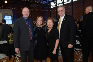 Socializing at the event, known as Broadway Bites for the event, are (l-r) Chris and Debbie Esterson and Jack and Susan Riddle. Starry, Starry Night