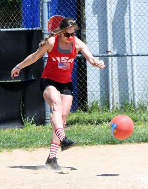Janine L’Italien boots the ball into the outfield.