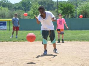 Shaun Handy, 11, takes a turn at pitching.