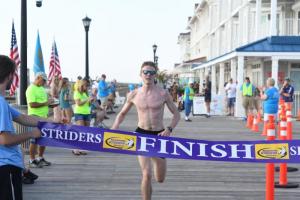 Race winner Ethan Burbridge completes the course in 17:15.