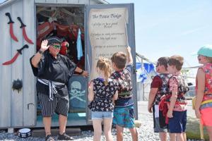 Gina Marotta has the little pirates take The Pirate Pledge.