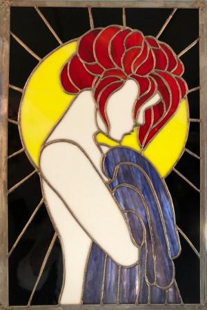 “Red Head,” stained glass by Yona Zucker, is now on display at CAMP Rehoboth.