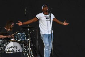 Jimmie Allen entertains the crowd with one of his rising country hits.