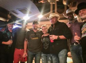 Local Jimmie Allen relaxes with his country star friends after the Jamboree in the Hills in Belmont, Ohio. Shown are (l-r) John Rich, Allen, local radio hosts, Toby Keith, Cowboy Troy and Big Kenny. SUBMITTED PHOTO