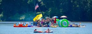 Dozens of people enjoy a cook out as they float on the Nanticoke River near downtown Seaford.