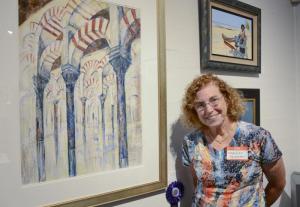 Marilyn Feldman with her pastel Endless Arches, that won an honorable mention.