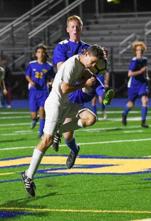 Cape’s Thomas Copeland has a run-in with Caesar Rodney’s Jacob Stant.