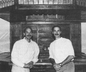 Twain Gonzales, left, and John Donato stand in front of the bar at their original location in the New Devon Inn, now Hotel Rodney, shortly before opening their doors in spring 1994. FILE PHOTO