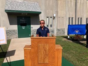 Delaware Department of Correction Commissioner Claire DeMatteis speaks before the unveiling ceremony.