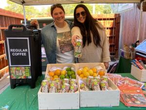 Justine Leaman, left, and Shai Sefiane man the bodega at Dogfish’s brewpub in Rehoboth Beach Oct. 22.