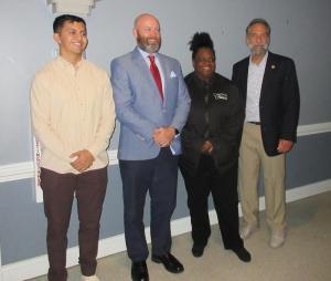 Representing Delaware Technical Community College are student-veteran recipients of a previous Elks scholarship donation. Shown are (l-r) Pedro Morales Lopez, Veterans Counselor Eric Eldridge, student Tyneshia White and Elk Dan Celia.