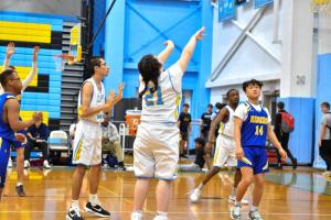 Sophia Adams makes Cape’s first basket in the unified game with Caesar Rodney.