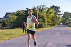 Matt Sparacino wins the 5K in 18:20.