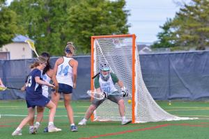 Anna Lopez makes a save on Eryn Callahan.