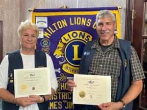 Milton Lions Club honorees shown are James McCarty Fellow Brenda Coverdale, left, silver, and Ralph Helm Fellow Bill Merza, bronze. Not pictured are Ted Reiver Fellows Maurice McGrath and Regina Coverdale, both bronze.
