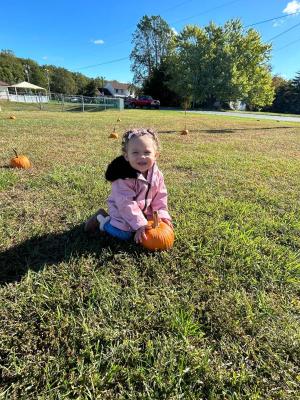 Kamilla Bowen is beaming after picking her pumpkin.