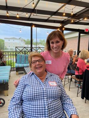 Karen Borges, right, who manages the Clothing Our Kids donation center, is shown with COK founder Mary Rio. BOB BLOUIN PHOTO