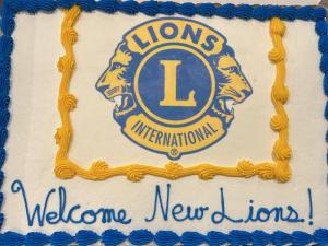 Lion Ray Quillen supplied a decorated cake to welcome the new Lewes Lions Club members.