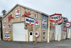 Vintage signs adorn a building at Tommy Town.