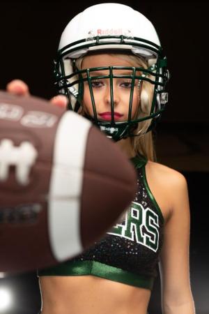 Football-player-poses-for-media-day-photos