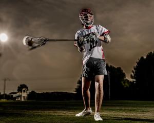 Male-LaCrosse-Athlete-Holding-LaCrosse-Stick