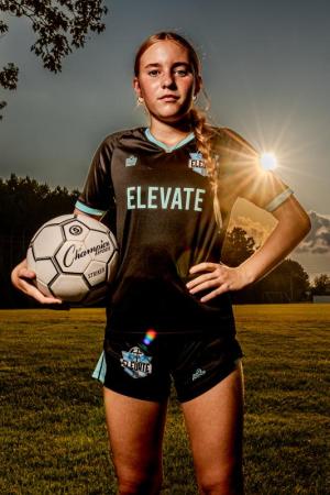 Female-soccer-player-poses-in-Delaware