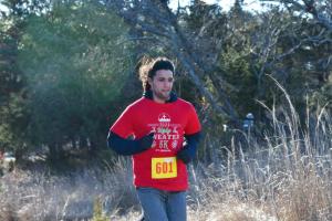 Garrett Mohammadioun wins the race in 18:05.