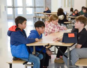 Students gathered for research presentations are (l-r) Kyle Guerin, Cristian Morales, Zoe Husbands and Carson Vonlindenberg.
