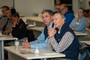 Beebe Medical Group primary care physicians John Hale, MD, and James Beebe, MD, hear about advancements in surgical care available for their patients.