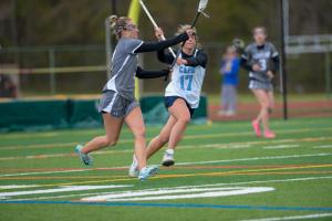 Regan Best plays defense in the midfield.