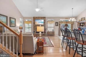 Open Family Room with a fireplace