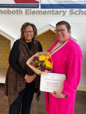 Rehoboth Elementary Principal Dr. Doris Person, left, congratulates Emily Cunningham on her recognition as Mentor of the Month.