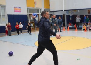 Troop 7 Lt. Nick DeMalto throws the last out for House Team Safety, earning them 100 house points.