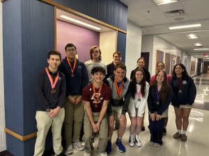 Sussex Academy students captured a host of medals at the 2026 Science Olympiad. Gathered in back (l-r) are Jack Thomas, Alexander De La Rosa Lopez, Jackson Marine, Carpenter Cunningham, Eva Navitskaya and Jaslene Brunskill. In front are Rocco Buonopane, Kieran Probert, Carolyn Reese, Leni Kuska and Camila Figueroa. SUBMITTED PHOTOS