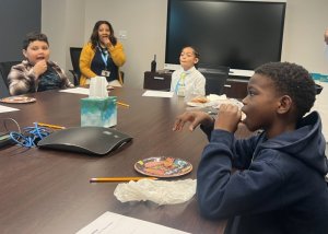 Taste-testing samples of in-house sausages from Hickman’s Meat Market are (l-) Malachi Juarbe, Assistant Principal Yvette Davenport, Gabe Cosme and E’Maurei Wise.