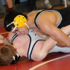 Cape's Tadeo Gonzalez locks up and defeats Sallies' 170-pounder Tommy Wilmouth in the second round. BY DAN COOK