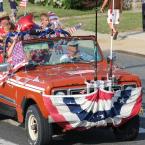 A classic surf vehicle, painted the color of the July 4 sun, helps bring a colorful conclusion to the 2012 Doo-Dah Parade.