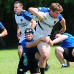 Delmarva player Andrew Sylvester tackles Rocky Gorge runner Dustin Meehan. BY DAN COOK
