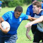 Delmarva's Corey Harden holds off a Rocky Gorge defender as he powers with the ball. BY DAN COOK