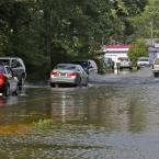 Sections of Route 5 are covered with water following heavy rains Aug. 25 and 26. BY RON MACARTHUR