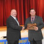 Closing the ceremony was the presentation of the gavel to outgoing President Troy Virden, right, by 2013 President Woody Magee. BY STEVEN BILLUPS