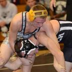 Cape senior Sean Sheehan grapples to a 13-3 major decision over Sussex Tech's Kyle Breckner in the 138-pound class. BY DAN COOK