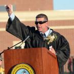 Speaker Jeff Evans jokes about having a one-card speech. BY DAN COOK