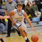 Junior guard Kai Vitella drives on an Indian River defender. BY DAN COOK