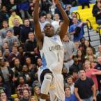 Cape's Jon Jon Warren goes in for a jam against Indian River. BY DAN COOK