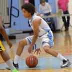 Cape senior point guard Toney Floyd sets up an offensive play. BY DAN COOK