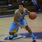 Tyreik Burton makes a move against Dover. BY DAN COOK